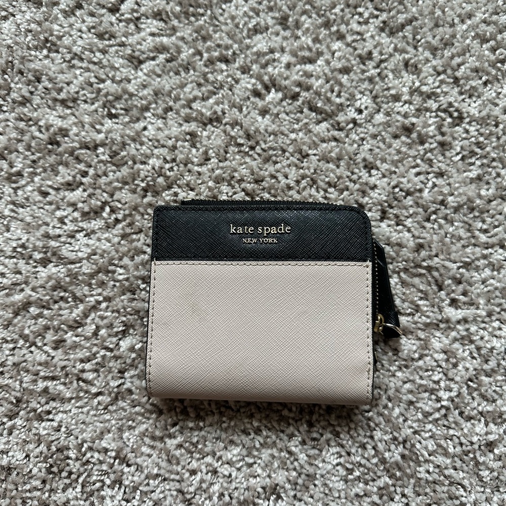 Small Kate Spade multi color snap wallet